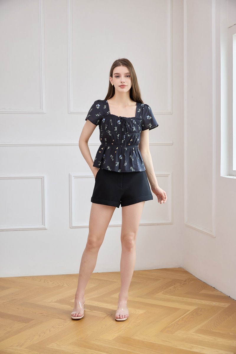 Greta Floral Peplum Top In Black