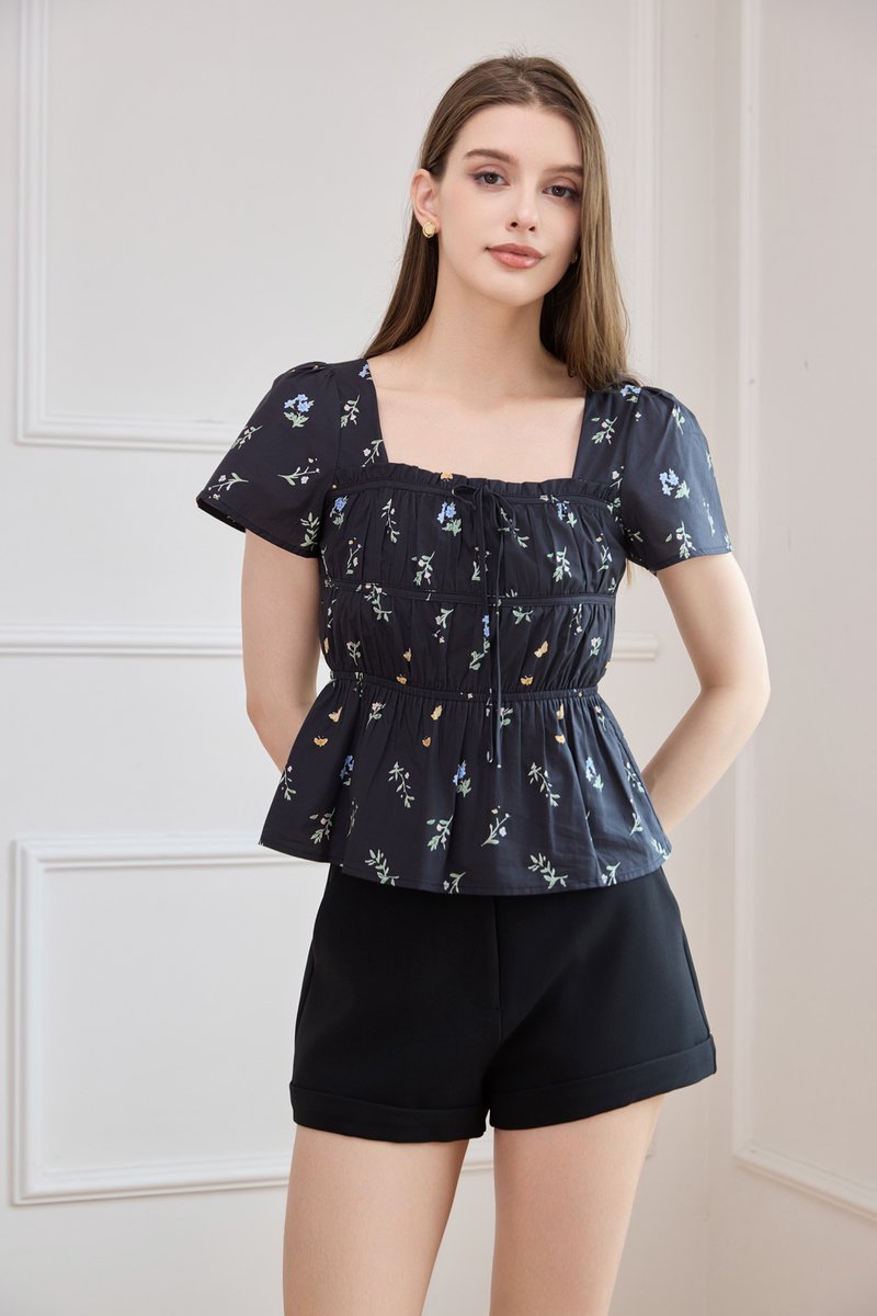 Greta Floral Peplum Top In Black