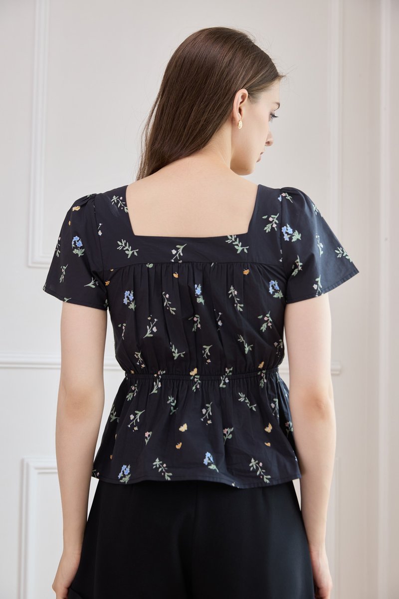 Greta Floral Peplum Top In Black
