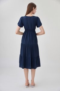 Alma Embroidered Tiered Midi Dress In Navy