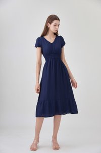 Rhea Textured Smocked Waist Midi Dress In Navy