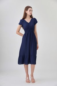 Rhea Textured Smocked Waist Midi Dress In Navy