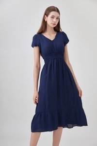 Rhea Textured Smocked Waist Midi Dress In Navy
