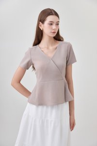 Fae Faux Wrap Peplum Top In Mushroom