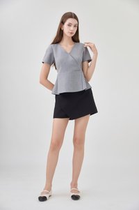 Fae Faux Wrap Peplum Top In Slate Grey
