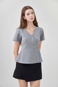 Fae Faux Wrap Peplum Top In Slate Grey