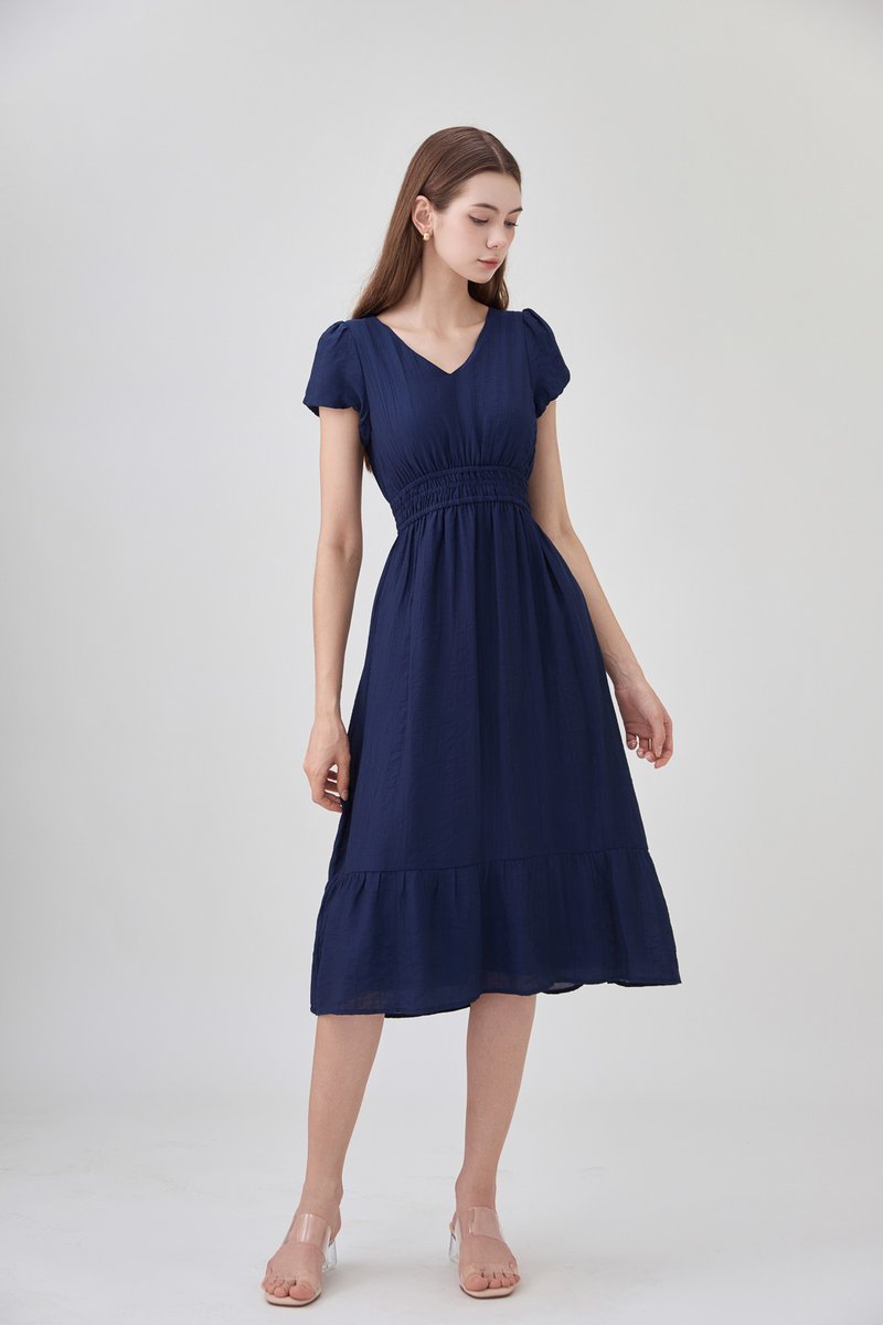 Rhea Textured Smocked Waist Midi Dress In Navy