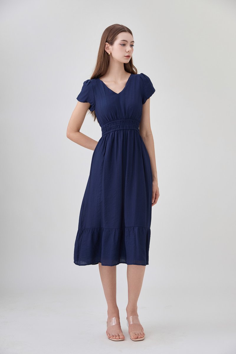 Rhea Textured Smocked Waist Midi Dress In Navy