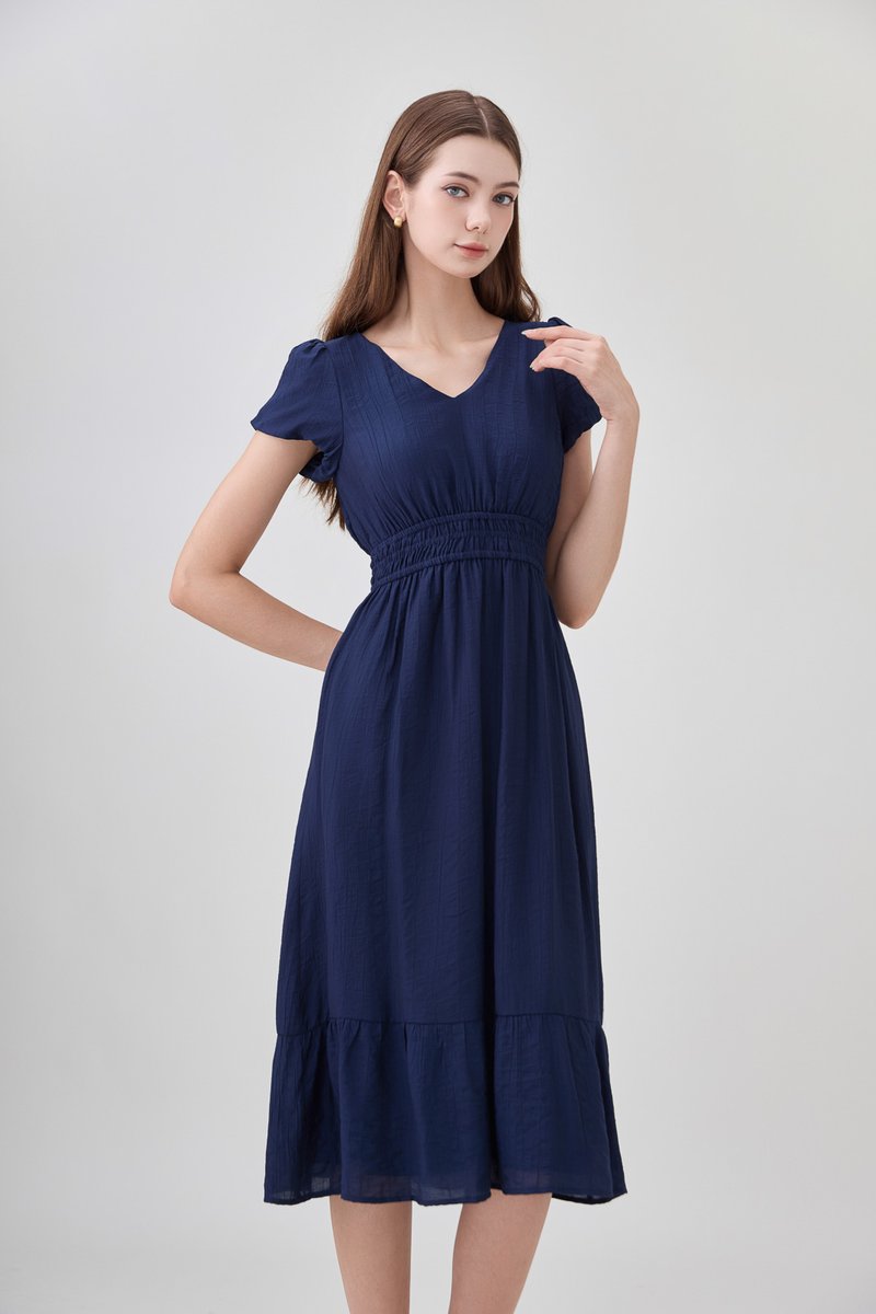 Rhea Textured Smocked Waist Midi Dress In Navy