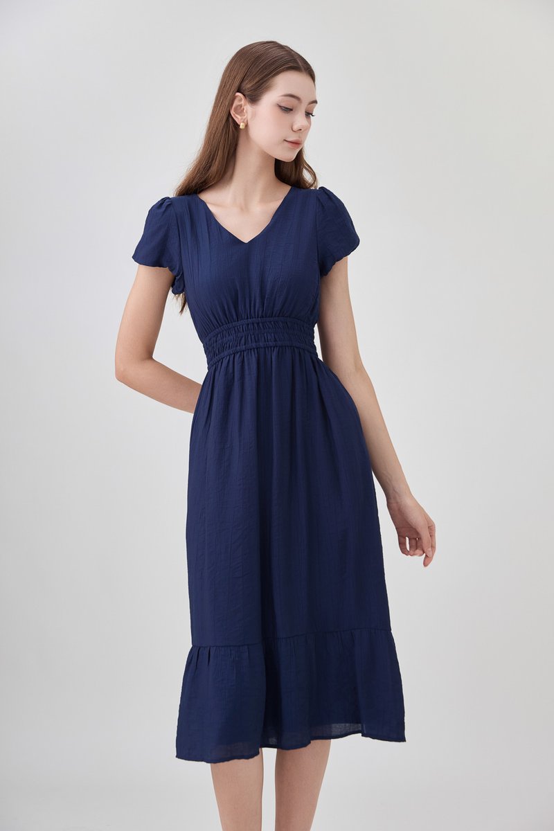 Rhea Textured Smocked Waist Midi Dress In Navy