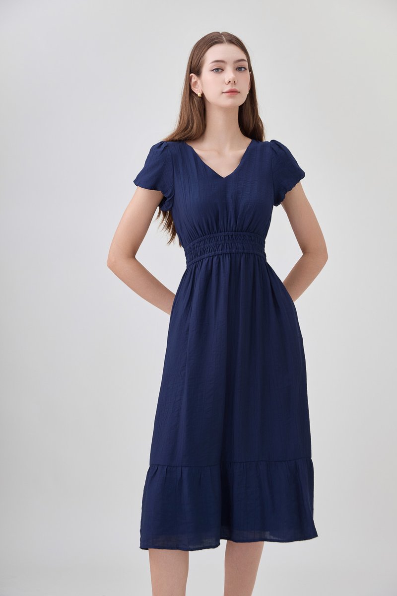 Rhea Textured Smocked Waist Midi Dress In Navy