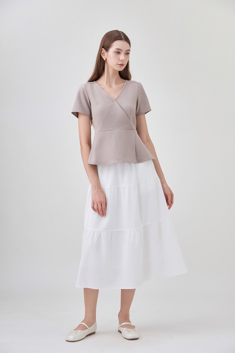 Fae Faux Wrap Peplum Top In Mushroom