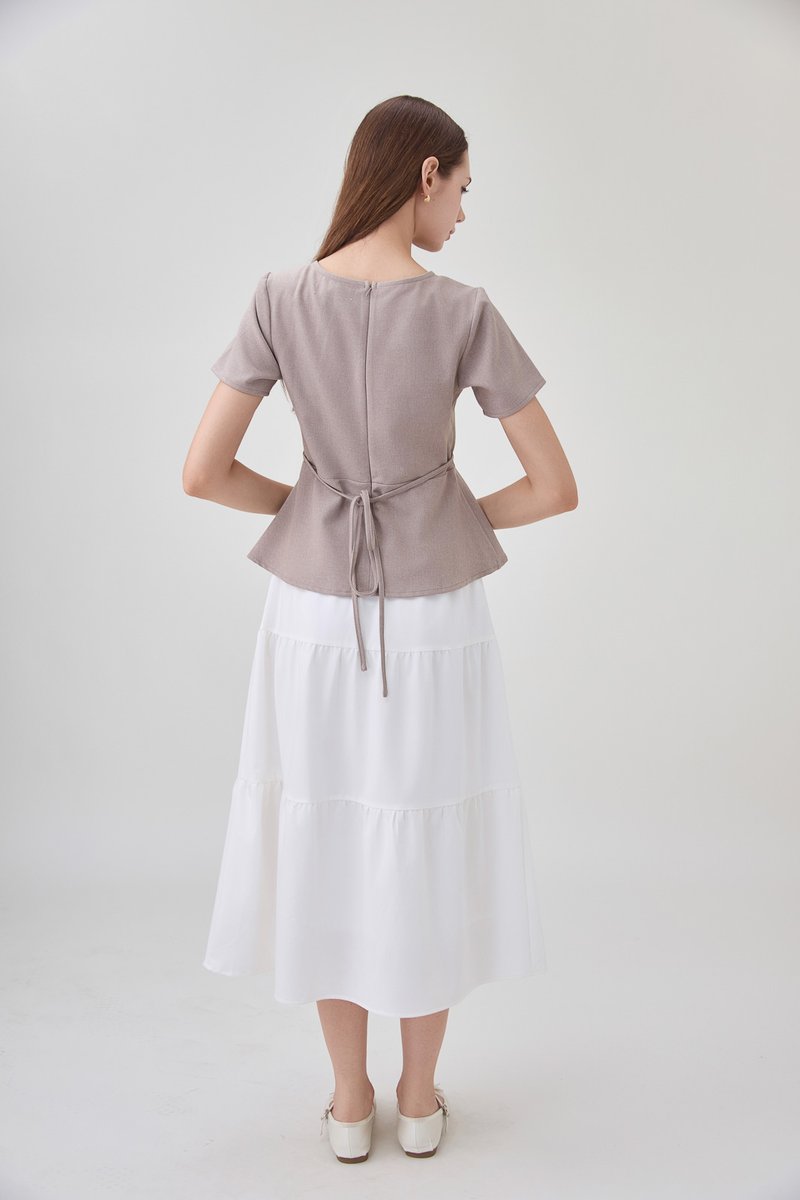 Fae Faux Wrap Peplum Top In Mushroom