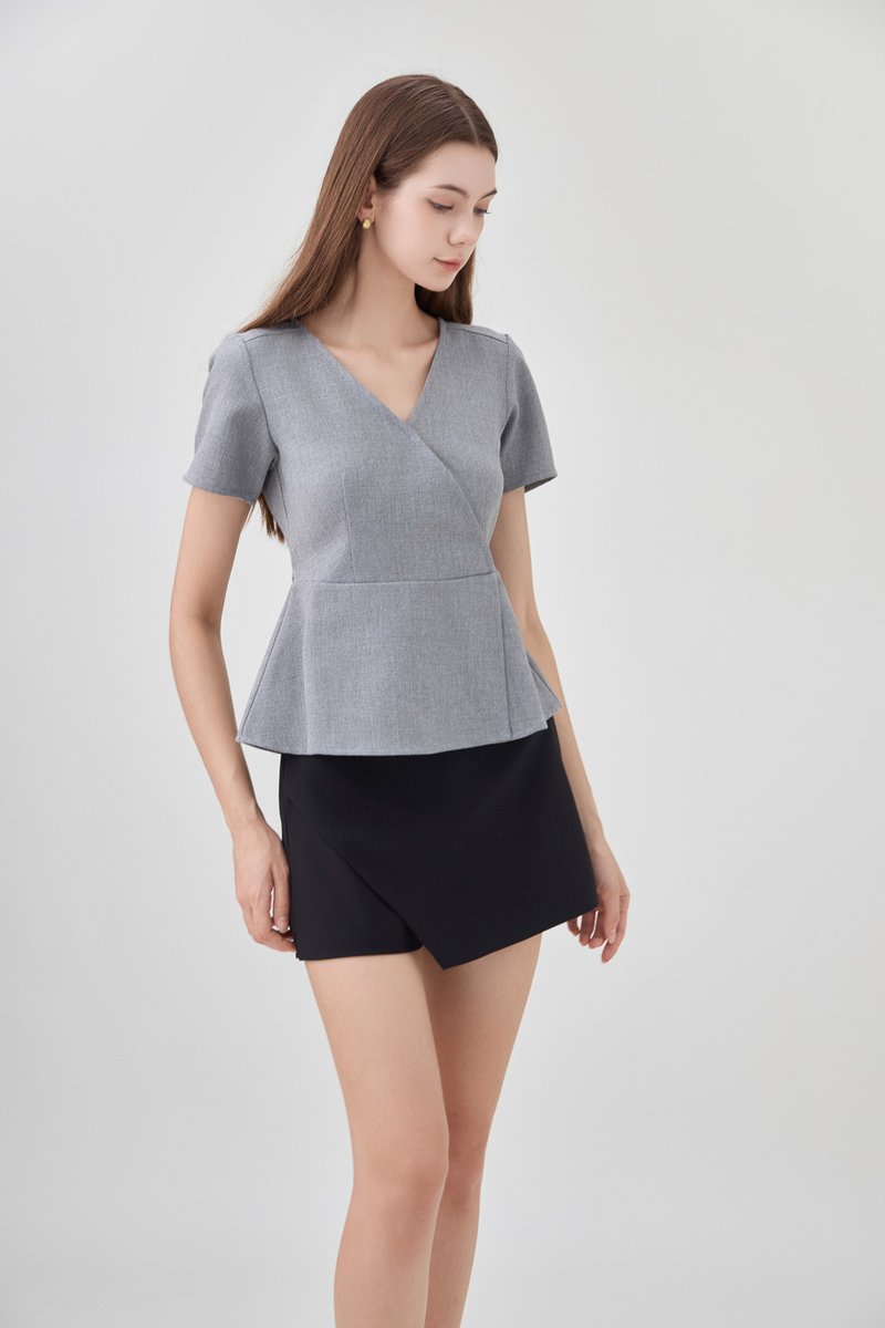 Fae Faux Wrap Peplum Top In Slate Grey