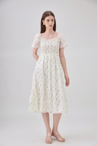 Emi Smocked Floral Midi Tier Dress In Cream