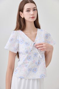 Reina Pastel Floral Ribbon Top In Soft Blue