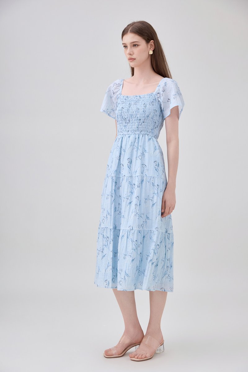 Emi Smocked Floral Midi Tier Dress In Powder Blue