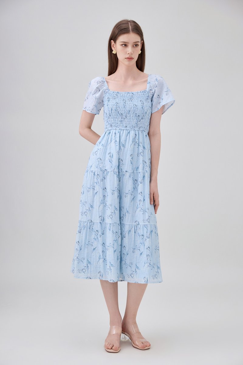 Emi Smocked Floral Midi Tier Dress In Powder Blue