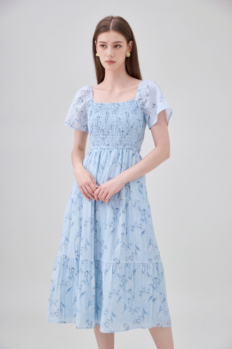 Emi Smocked Floral Midi Tier Dress In Powder Blue