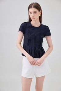 Ainara Pintuck Pleated Peplum Top In Navy