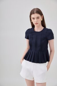 Ainara Pintuck Pleated Peplum Top In Navy