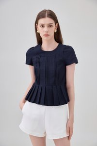 Ainara Pintuck Pleated Peplum Top In Navy