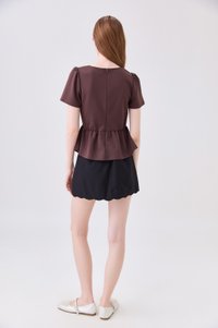 Zelie Staple Scallop Hem Skort In Black