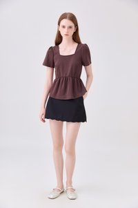 Zelie Staple Scallop Hem Skort In Black