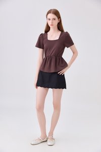 Zelie Staple Scallop Hem Skort In Black