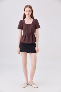 Zelie Staple Scallop Hem Skort In Black