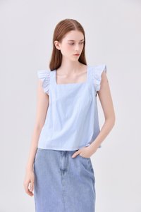 Delaney Swiss Dot Ruffles Top In Powder Blue