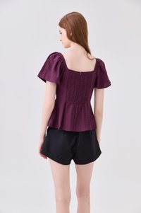 Zelia Peplum Top In Plum