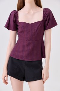 Zelia Peplum Top In Plum