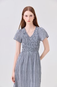 Brynlee Smocked Gingham Midi Dress In Black