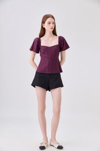 Zelia Peplum Top In Plum
