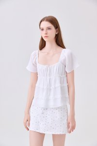 Evelina Textured Ruffles Ribbon Top In White