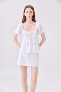 Evelina Textured Ruffles Ribbon Top In White