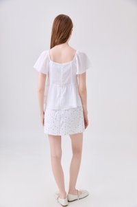 Evelina Textured Ruffles Ribbon Top In White