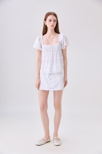 Evelina Textured Ruffles Ribbon Top In White