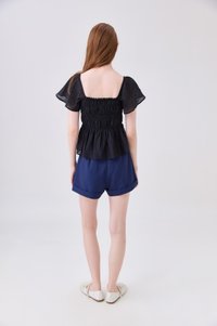 Calista Textured Smocked Top In Black
