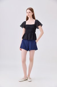 Calista Textured Smocked Top In Black
