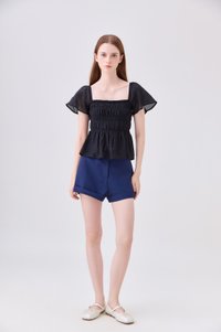 Calista Textured Smocked Top In Black
