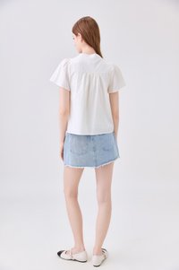 Journee Pintuck Ribbon Top In Cream