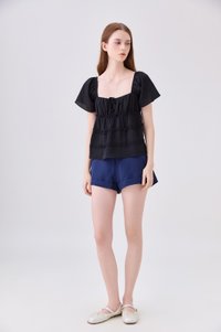 Evelina Textured Ruffles Ribbon Top In Black