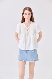 Journee Pintuck Ribbon Top In Cream