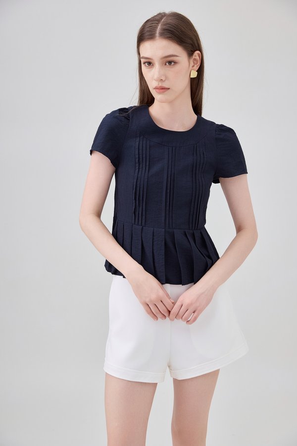Ainara Pintuck Pleated Peplum Top In Navy