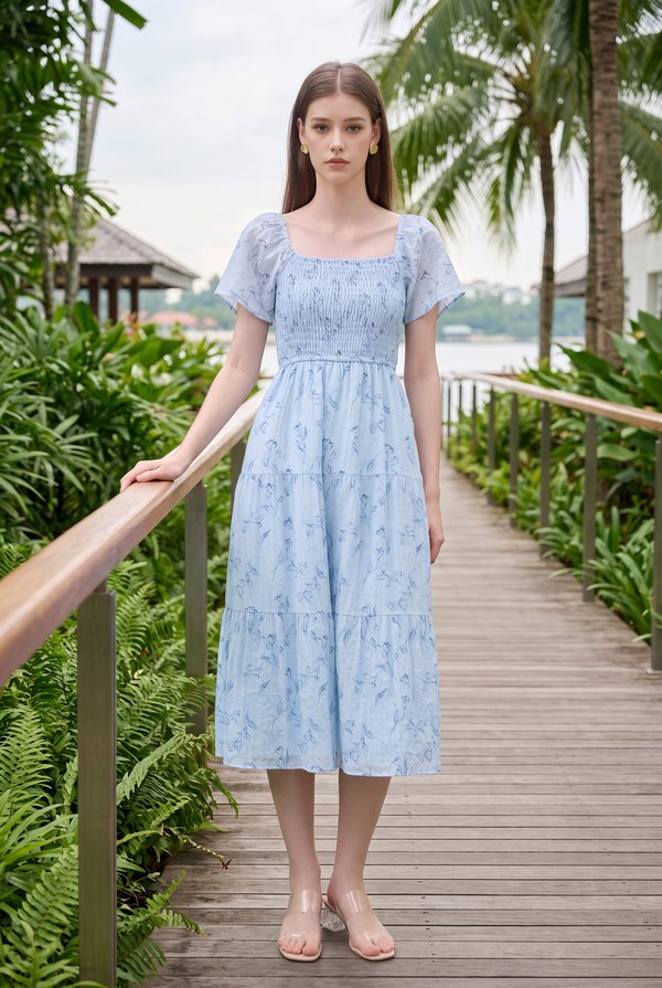 Emi Smocked Floral Midi Tier Dress In Powder Blue