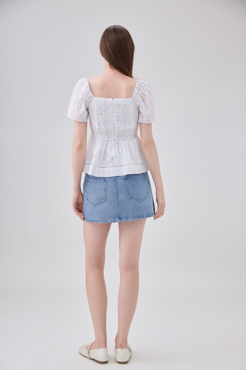 Eira Floral Peplum Top In Blue