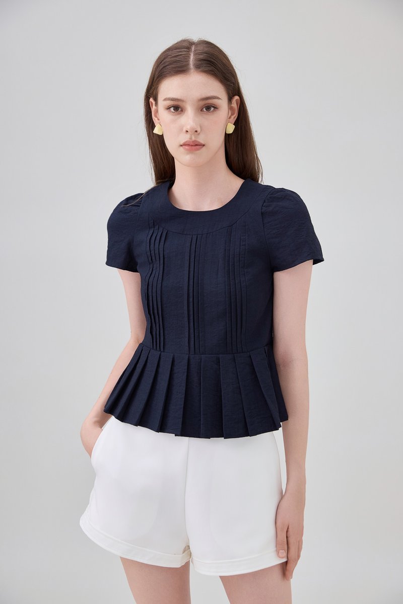 Ainara Pintuck Pleated Peplum Top In Navy