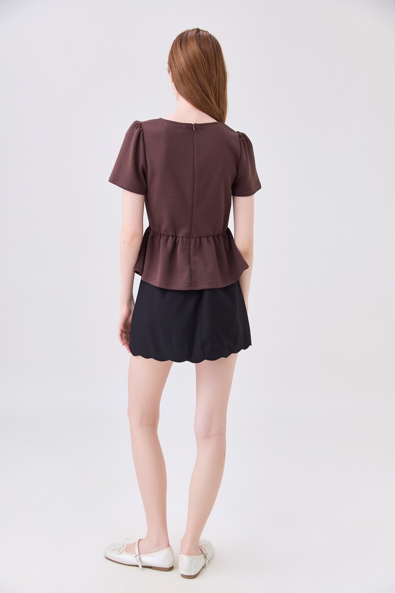 Zelie Staple Scallop Hem Skort In Black